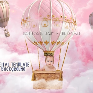 May include: Digital template background showing a baby in a hot air balloon basket. The balloon is pink and white with gold detailing, set against a pink, cloudy sky. Text reads "JUST PASTE BABY IN THE BASKET!" and "DIGITAL TEMPLATE Background".