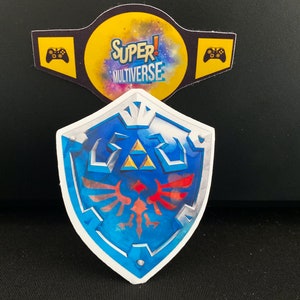 Hylian Shield Sticker [ The Legend Of Zelda , Nintendo , N64 , Ocarina of Time , Hyrule , Birthday , Gift , Holiday , Halloween , Christmas]