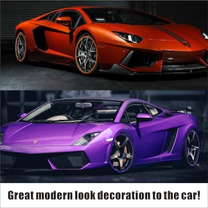 May include: Two luxury sports cars are displayed. The top car is orange with black accents and racing stripes. The bottom car is purple. The text at the bottom reads: Great modern look decoration to the car!