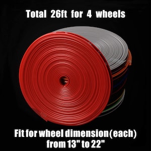 May include: A stack of coiled wheel rim protectors in red, gray, and other colors. The text states "Total 26ft for 4 wheels" and "Fit for wheel dimension (each) from 13" to 22".