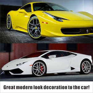 May include: Two sports cars are featured in this image. The top car is yellow with black wheels and yellow accents. The bottom car is white with red brake calipers. The text at the bottom reads: Great modern look decoration to the car!