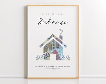 Könnte beinhalten: Ein weißer gerahmter Druck mit einer Hausform aus Euro-Scheinen. Der Text "FÜR EUER NEUES Zuhause" befindet sich oben auf dem Druck. Das Zitat "Ein Zuhause ist nicht nur ein Ort, sondern ein Gefühl." von Christian Morgenstern befindet sich unten auf dem Druck.