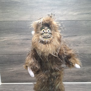 Harry and the cheap hendersons talking doll