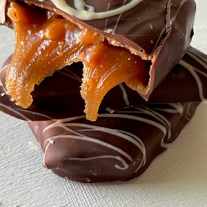 Peanut caramels handmade in a red tin