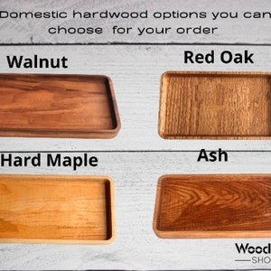May include: Four wooden trays in different wood types: walnut, red oak, hard maple, and ash. The trays are all rectangular and have a natural wood finish. The text "WoodPro - SHOP" is at the bottom of the image.