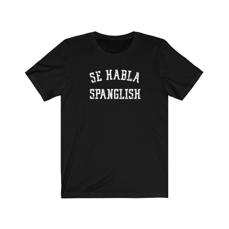 May include: Black t-shirt with white text that reads "Se Habla Spanglish".