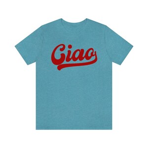May include: A light blue t-shirt with a red retro-style graphic that says "Ciao".