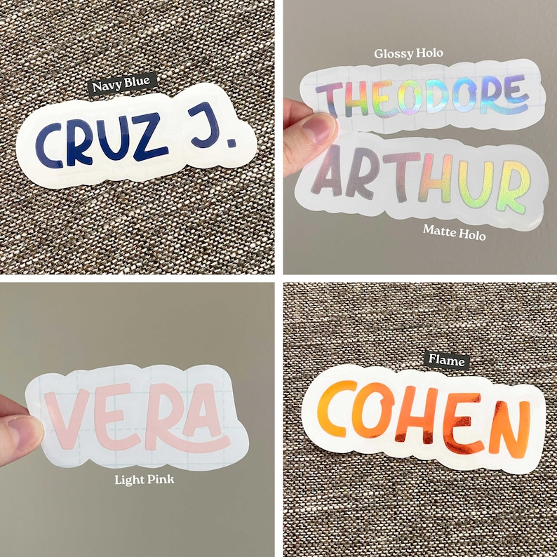 May include: A collection of custom name stickers featuring various finishes and colors. The stickers display the names Cruz J. in navy blue, Theodore in glossy holo, Arthur in matte holo, Vera in light pink, and Cohen in a flame orange gradient.
