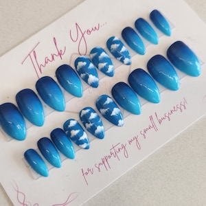 Blue Ombre Cloudy Sky Almond Nails