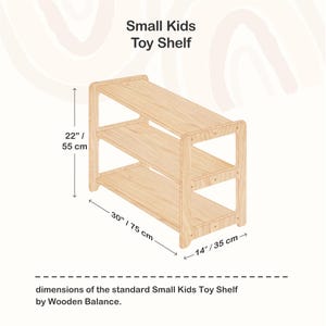 May include: A light-colored wooden toy shelf with three tiers. The shelf is 30 inches long, 22 inches high, and 14 inches deep. The text "Small Kids Toy Shelf" is at the top. Dimensions are provided in inches and centimeters.