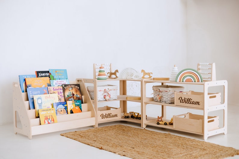 May include: A set of wooden shelves with a book shelf, a rainbow toy, and a wooden toy horse. The shelves are labeled "William".