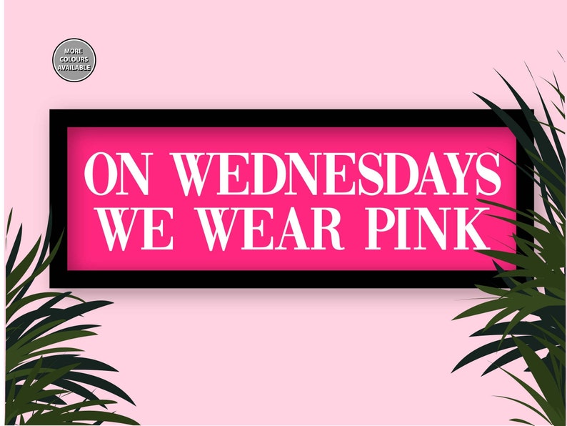 May include: A pink sign with black trim and the text "ON WEDNESDAYS WE WEAR PINK" in white letters.