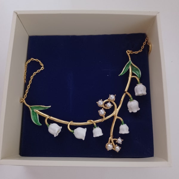 Bill Skinner- floral necklace with lily of the valley which is traditionally a good luck charm. This necklace is hand-enamelled gold plated.