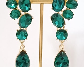 Oscar de la Renta- Boucles d'oreilles incrustées de cristaux couleur verte.