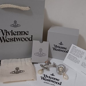 Vivienne Westwood Verzilverde oorbellen met faux parels, kristallen en saturnus. afbeelding 2