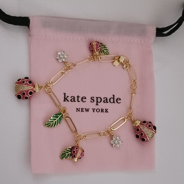 Kate SPADE- New York- Bracelet coccinelles. En plaqué or, émaillé à la main et incrusté de strass lumineux