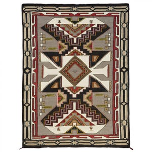 May include: A rectangular rug with a geometric design. The rug features a central diamond shape surrounded by stepped patterns in black, white, red, and gray. The border is black with geometric accents. The rug is likely made of woven material.