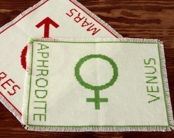Cloths with Venus and Mars symbols hand embroidered