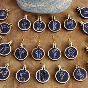 Earrings with runes hand embroidered