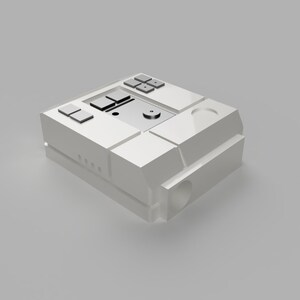 May include: A white, rectangular device with a small, round, silver button in the center. The device has a series of square buttons on the top and a series of small, round holes on the side.