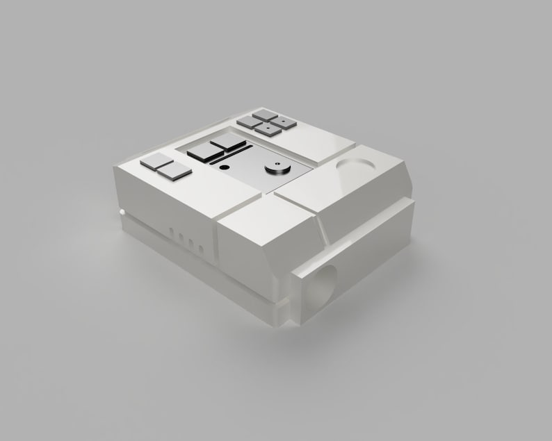 May include: A white, rectangular device with a small, round, silver button in the center. The device has a series of square buttons on the top and a series of small, round holes on the side.