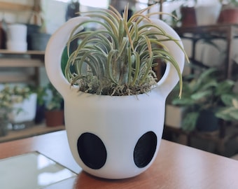 Hollow knight ghost head plant pot and hornet head plant pot / planter 3d printed in PLA