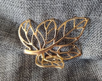 Hair clip with gold leaf design
