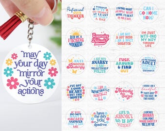 May include: Twenty colorful round keychain designs with various sassy sayings. The keychains are white with black text and colorful accents. Some of the sayings include "May your day mirror your actions", "I am not snarky, I am selectively polite", "Life is short, so is my patience", and "I'm just WTF-ing my way through life".