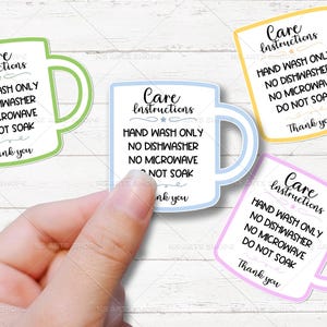 May include: Four mug-shaped stickers in green, blue, yellow, and pink, each with a white interior and a colored outline. The stickers display care instructions: "Hand wash only, no dishwasher, no microwave, do not soak, thank you."