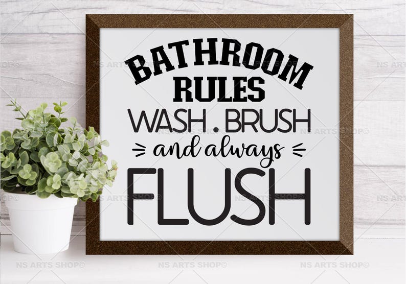 May include: A brown framed sign with white background and black text that reads "Bathroom Rules Wash. Brush = and always = Flush".