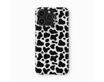 Custodia per telefono con stampa mucca e chiusura a scatto / Cover rigida con stampa animalier in bianco e nero e chiusura a scatto
