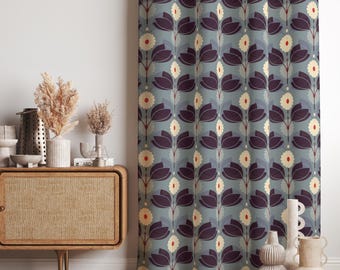 May include: A patterned curtain with a repeating floral design. The flowers have dark purple petals, cream-coloured centres, and red accents, set against a muted teal background. The curtain is made of a thick fabric.