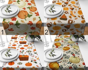 May include: A set of four fall-themed table runners. Each runner features a different design with pumpkins, leaves, and other autumn motifs. The color palettes include orange, cream, and brown, perfect for seasonal decor.