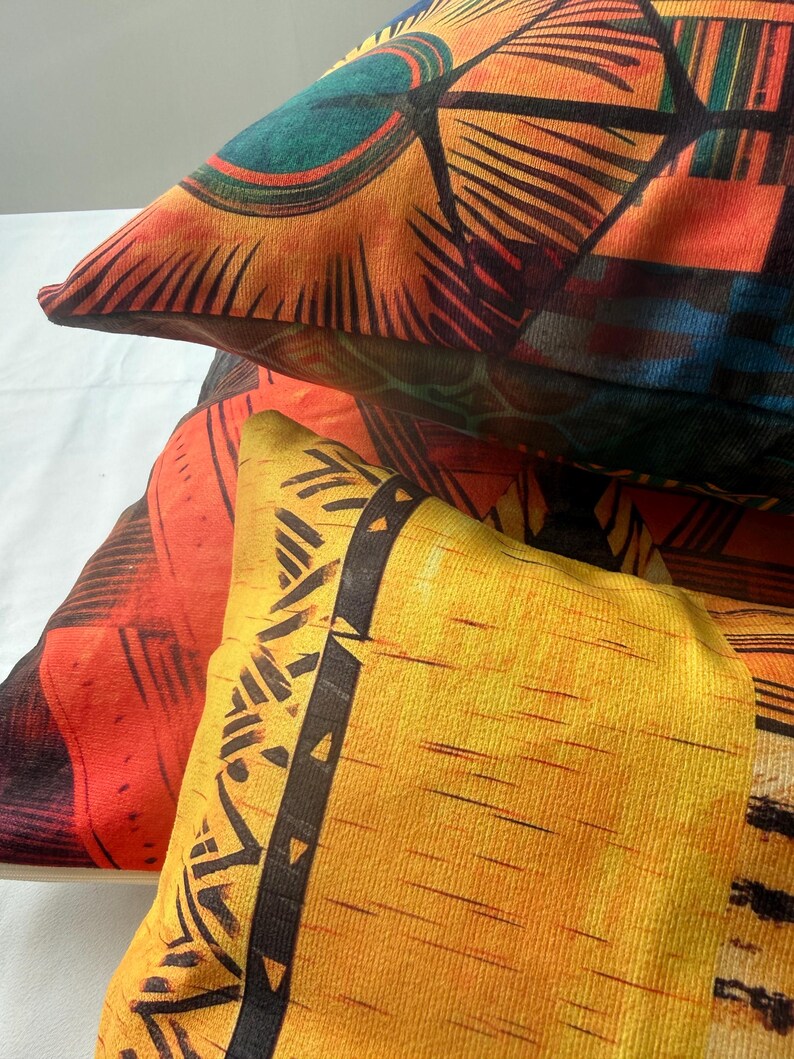 a close-up view of a collection of colorful, patterned pillows.