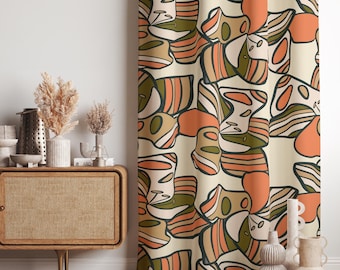 May include: Cream-coloured curtain with a repeating abstract pattern in shades of orange, olive green, and brown. The design features organic shapes with black outlines, creating a retro, mid-century modern aesthetic. The curtain is a decorative home decor item.