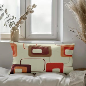 May include: A set of three ceramic mugs with a speckled, matte finish. Each mug features a different color: light blue, cream, and gray. The mugs have a simple, modern design and a comfortable handle.