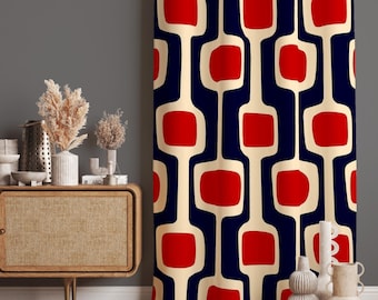 May include: A patterned curtain with a retro design. The curtain features a repeating pattern of red squares and cream rectangles against a navy blue background. The curtain is hanging in front of a grey wall.