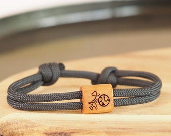 Wooden bracelet around the world made of sailing rope with travel motifs, year abroad, trip abroad