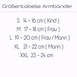 May include: A white graphic with the text "Gr&ouml;&szlig;entabelle Armb&auml;nder" and size measurements for bracelets. Sizes range from S (14-16 cm) to XXL (23-24 cm). The text also indicates the size is for a child, woman, or man.