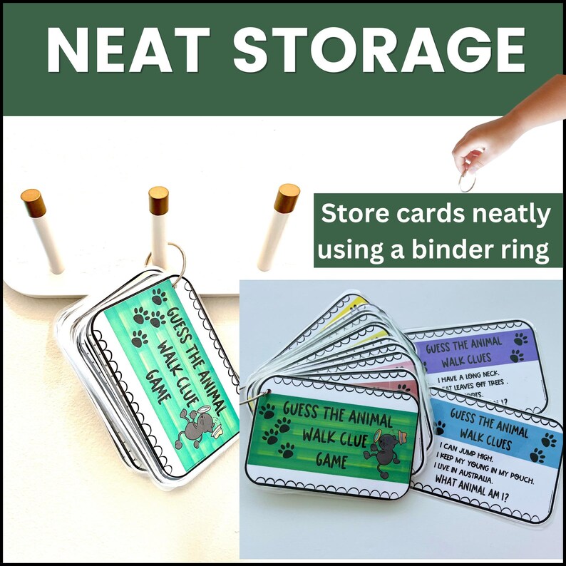 May include: A set of colorful cards with the text "Guess the Animal Walk Clue Game" on each card. The cards are held together with a binder ring. The cards are on a white surface with three gold-colored dowels.