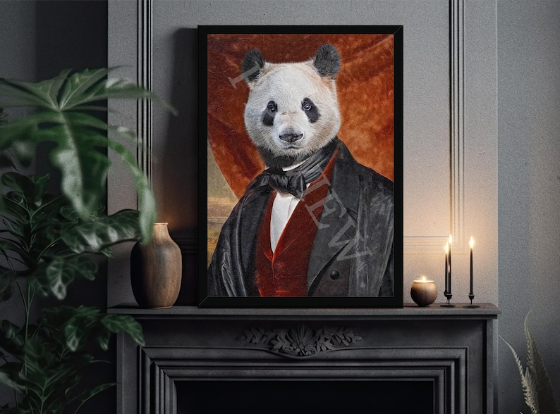 May include: A black framed portrait of a panda wearing a black suit with a red waistcoat and a white bow tie. The background is a red and orange gradient.