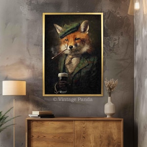 May include: A framed artwork depicts a fox in a green plaid jacket and hat, smoking a cigar and holding a glass of dark beer. The artwork has a gold frame and the text "&copy; Vintage Panda" at the bottom.