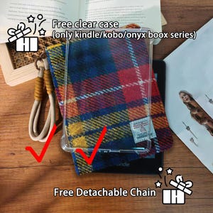 May include: A clear case for a Kindle device, featuring a colorful plaid pattern in red, blue, and yellow. The case includes a free detachable chain. The text on the case reads "Kindle".