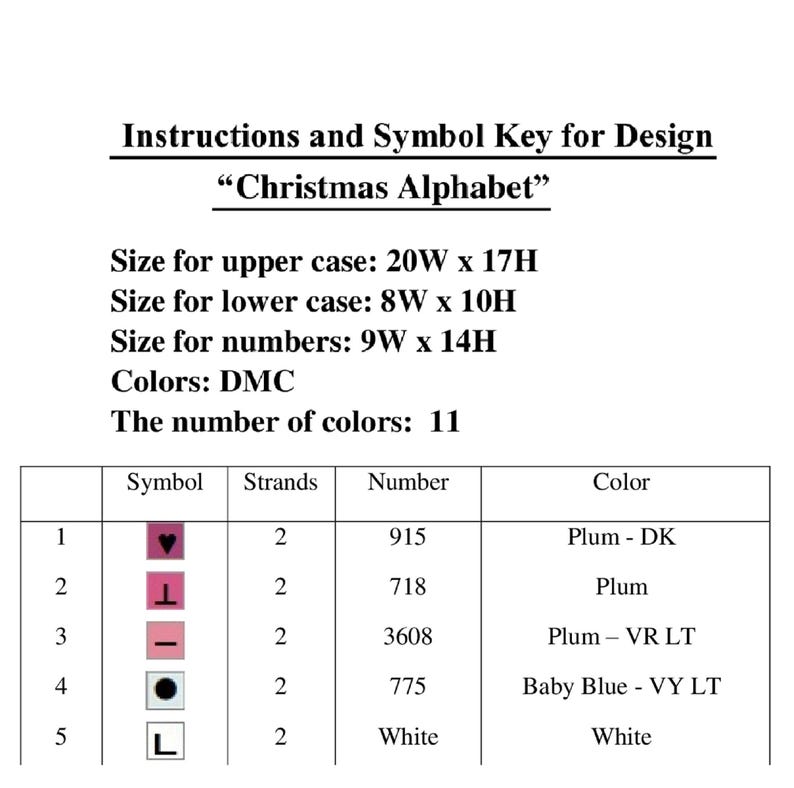 May include: A chart with instructions and a symbol key for a cross-stitch design titled "Christmas Alphabet." It includes sizes for uppercase, lowercase letters, and numbers, along with a color key using DMC colors. The design uses 11 colors.