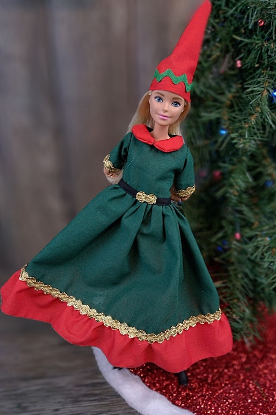doll and me christmas dress Kirby (Truly Me 85) looks beautiful in this Bitty Baby dress. I love the  color, the shoes, the skirt on the dress, and the snowflakes!  Little  Foot wanted in on the photos.