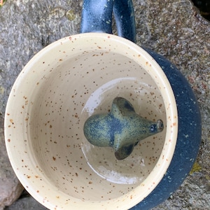 Hand-potted, hand-glazed cup/coffee cup/tea cup/clay cup/ceramic cup with burned-in elephant on the bottom/morning cup