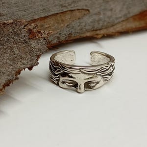 Venus sculpture half face Ancient Greek mythology, goddess Aphrodite eyes open finger ring Renaissance vintage, retro antique silver