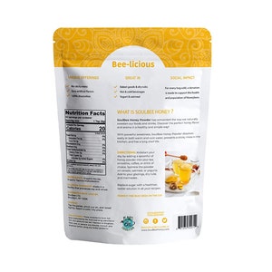 May include: A white resealable pouch with a yellow and orange design. The pouch contains SoulBee Honey Powder, a natural sweetener made with organic honey. The back of the pouch includes nutritional information, directions for use, and information about the product's social impact.