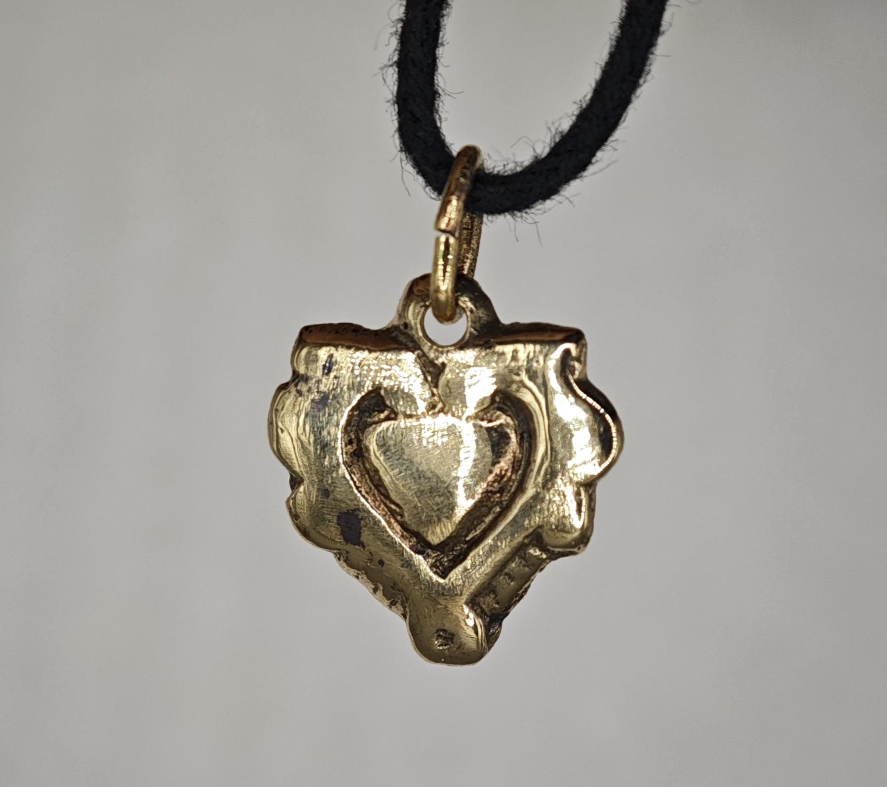 Small ancient Viking heart. Valentine's card of the Viking. Antique pendant. Antique pendant with a heart of the Viking Age 10-11 AD