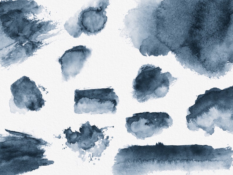 May include: A collection of 12 abstract watercolor shapes in shades of blue. The shapes are various sizes and are arranged in a random pattern on a white background.